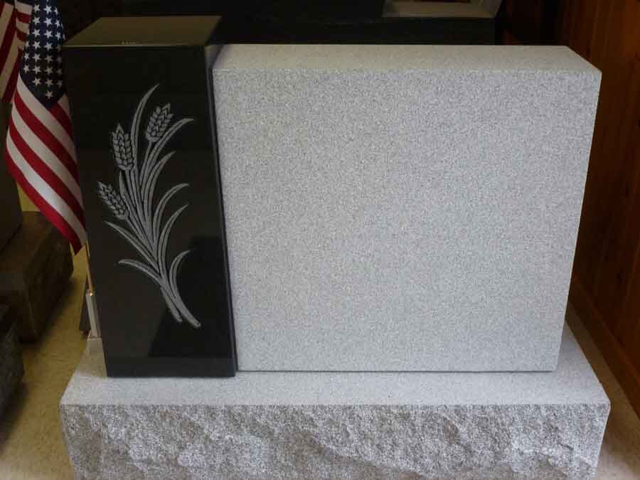 Detail of carved wheat sheaf on a granite headstone